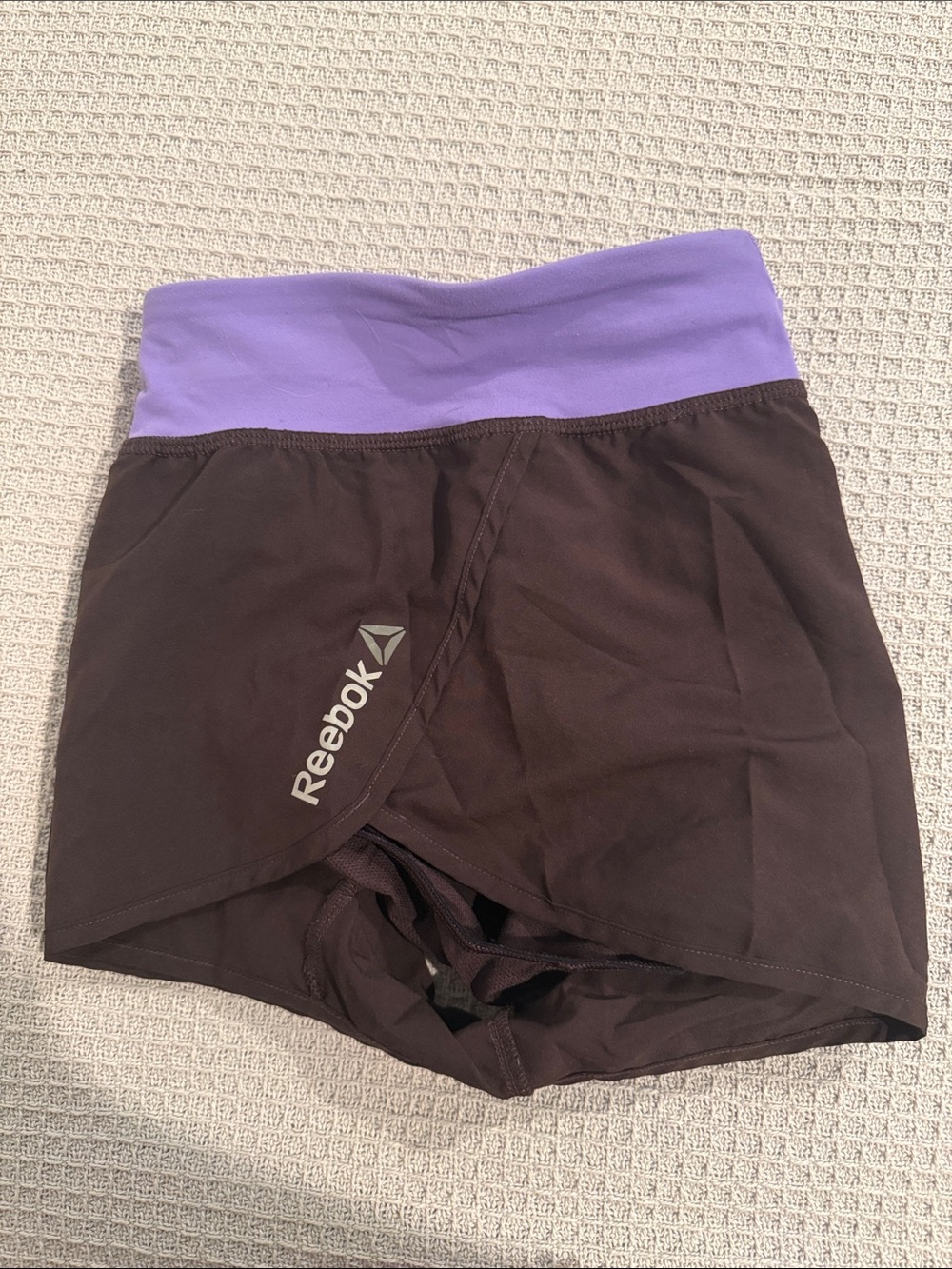 Reebok Women’s Black Bike Shorts with Purple Waistband